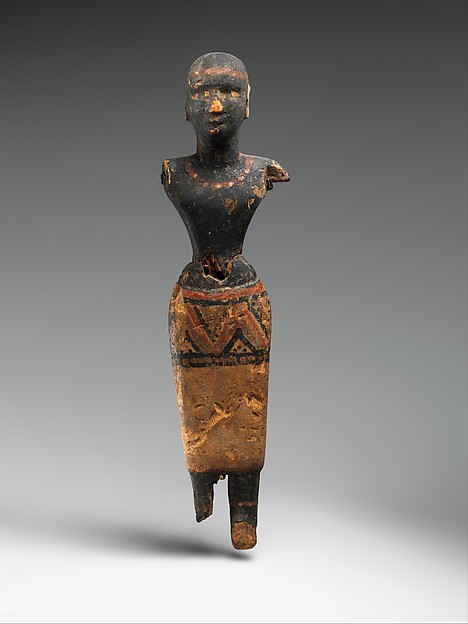 Ancient painted wood figure of a woman of Nubian descent